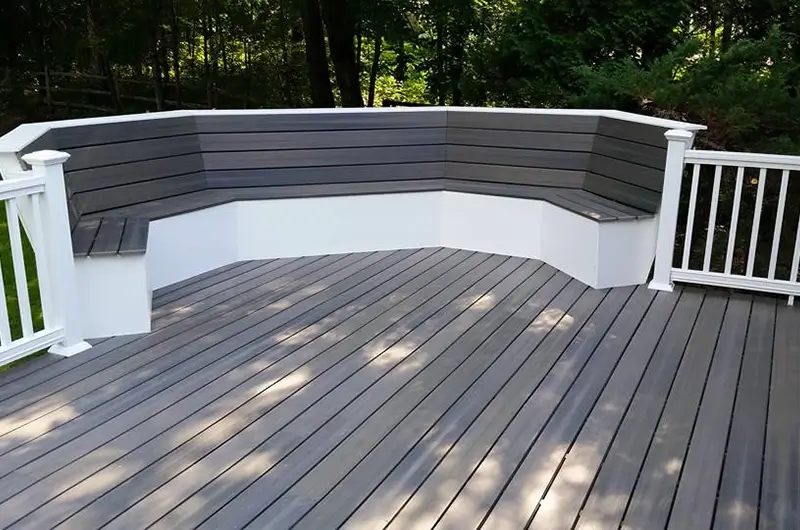 newly built deck addition gray contrasting white